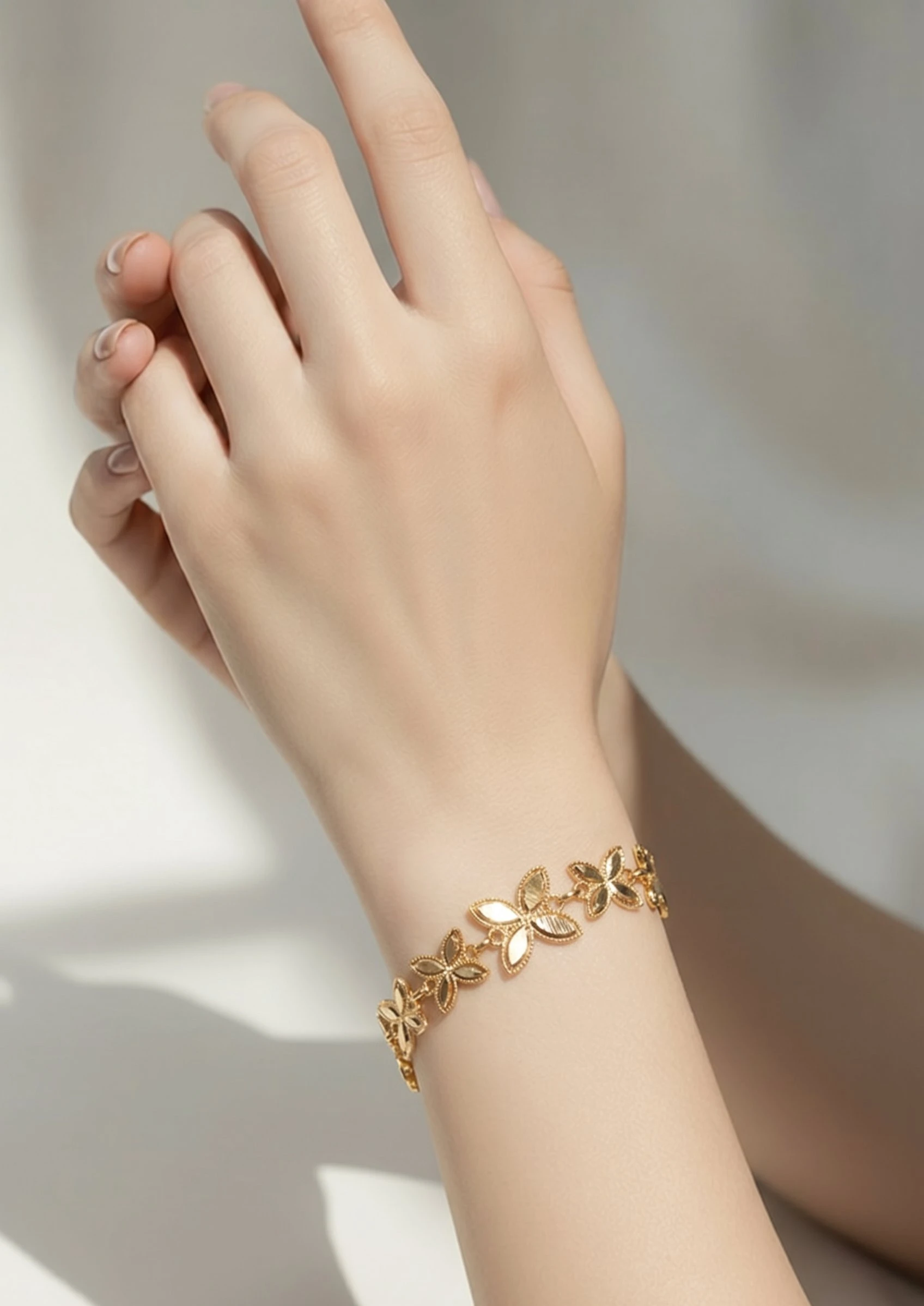 “Garden of Grace” 21K Gold Bracelet – Openwork Leaf Design